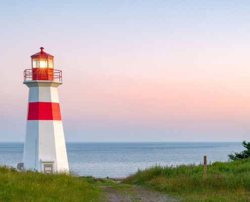 Lighthouse in New Brunswick during sunset.