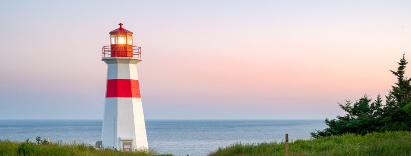 Lighthouse in New Brunswick during sunset.