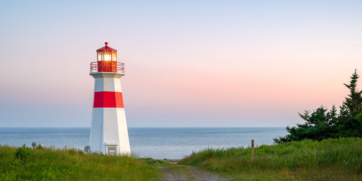 Musquash head lighthouse at dusk Lighthouse in New Brunswick during sunset.